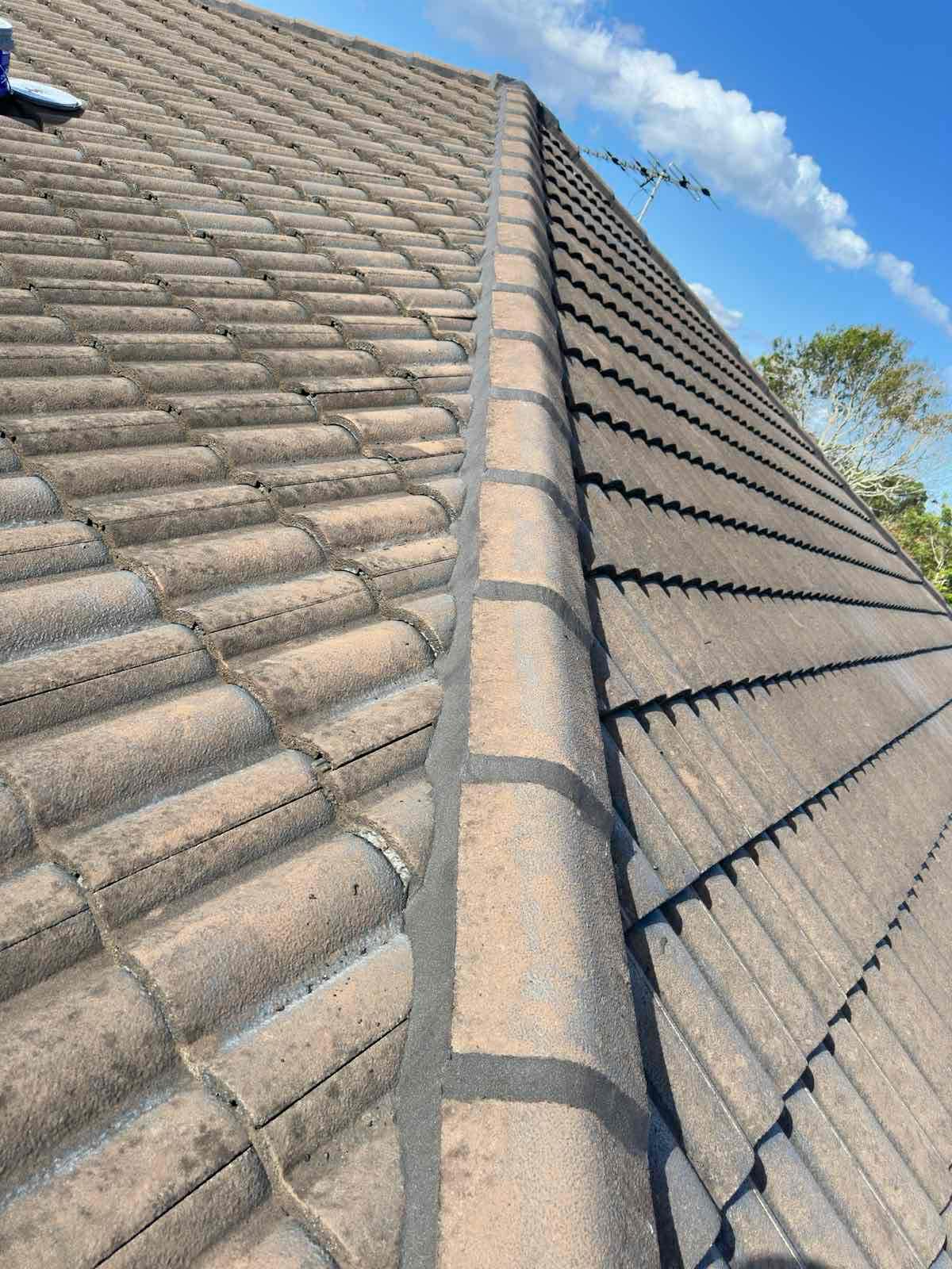 Concrete tile re-bedding and pointing ridge capping